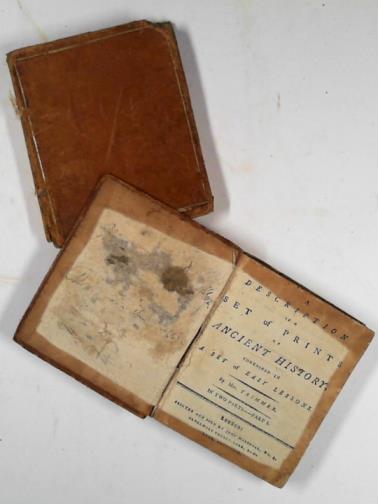 TRIMMER, Sarah - A decription of a set of prints of ancient history contained in a set of easy lessons, Parts one and two bound on one volume. WITH A series of prints of ancient history designed as ornaments for those apartments in which children receive the first rudiments of their education